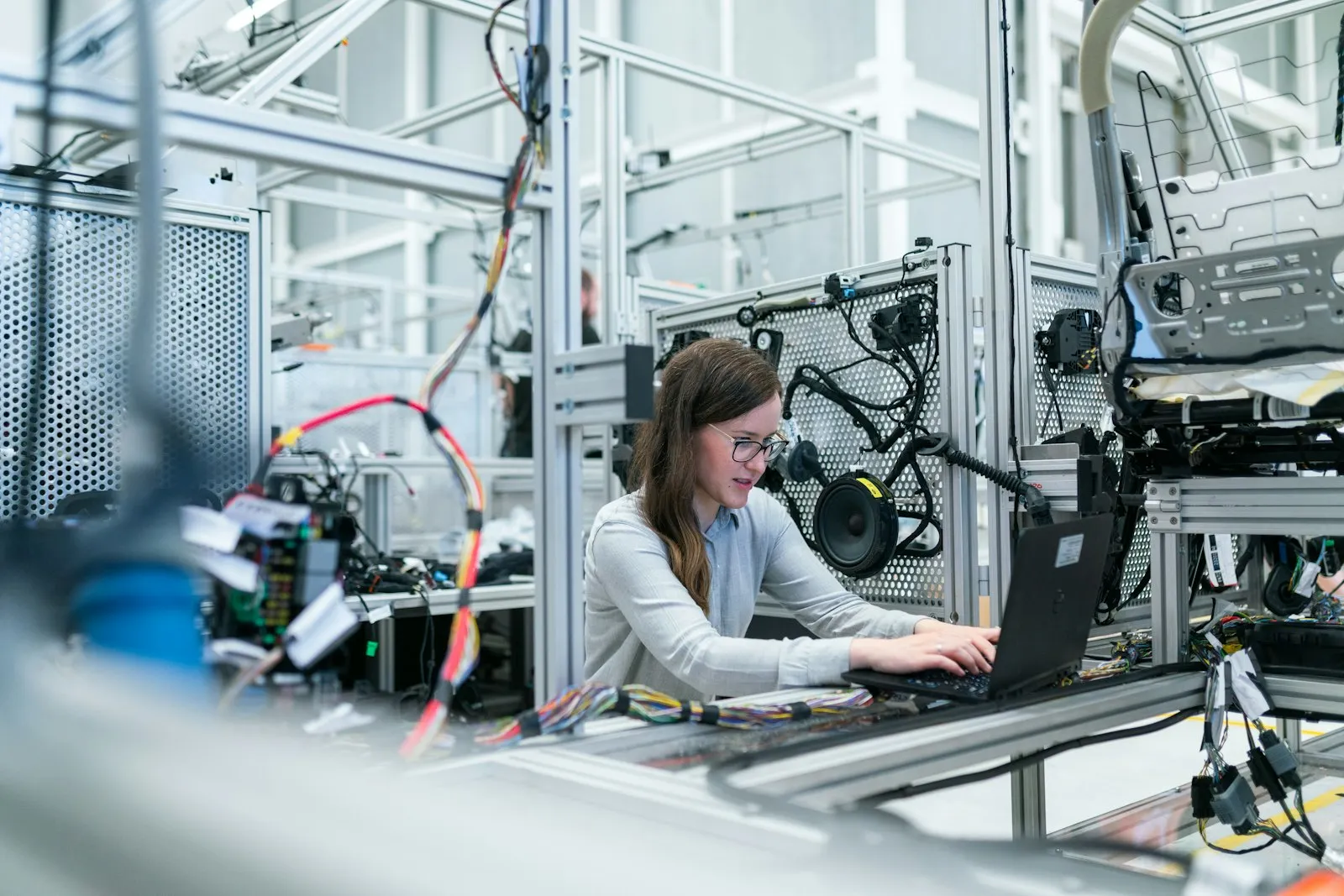 Engineer working with industrial equipment where visual inspection and sensor data matter
