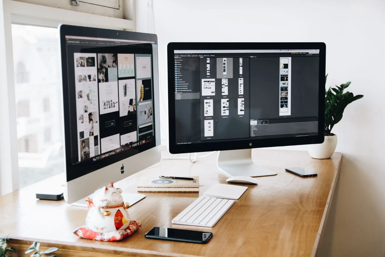 Website design workspace with layouts in progress on screen
